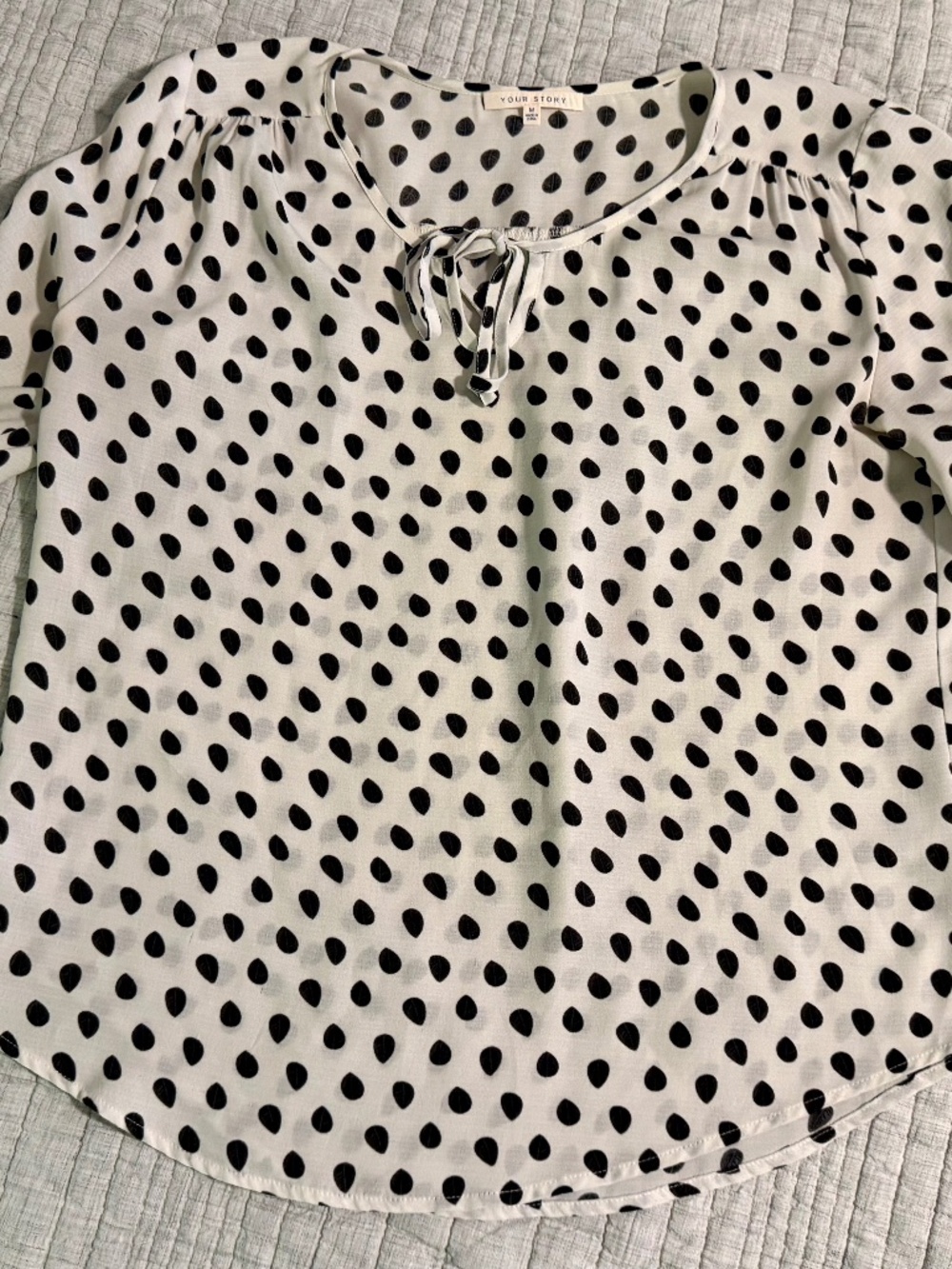 White 3/4 length sleeve blouse with black polka dots